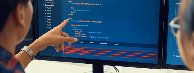 female-programer-explain-while-pointing-code-displayed-computer-professional-programmer-present-data-analysis-writing-java-script-modern-company-office-closeup-burgeoning_31965-250896